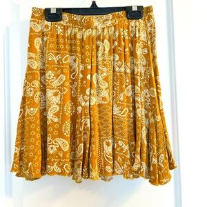 Fun and flirty skirt! Mustard gold paisley print